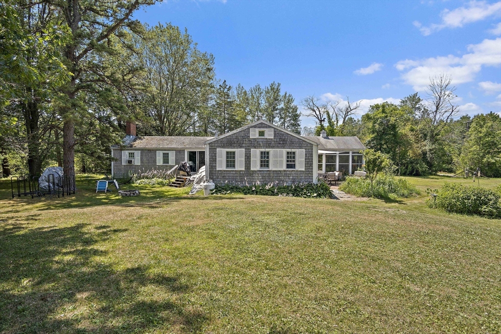 2 Highfield Road Newbury, MA 01951 - Photo 32 of 36 a front view of a house with swimming pool having outdoor seating