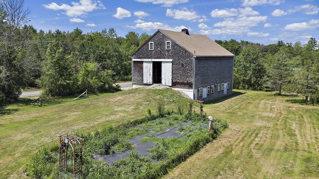 2 Highfield Road Newbury, MA 01951 - Photo 4 of 36 a front view of a house with a yard