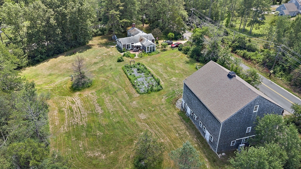 2 Highfield Road Newbury, MA 01951 - Photo 6 of 36 an aerial view of a house with a yard and trees