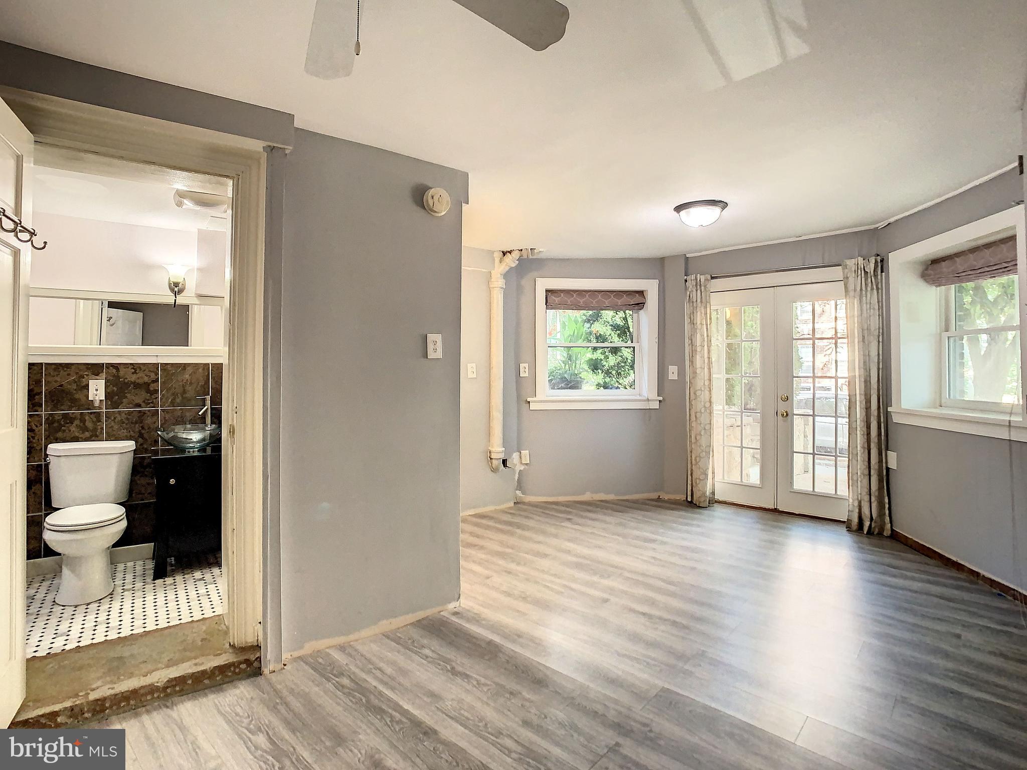 2850 27th Street Northwest Washington, DC 20008 - Photo 24 of 32 Lower Level Bedroom with French Doors and Entrance