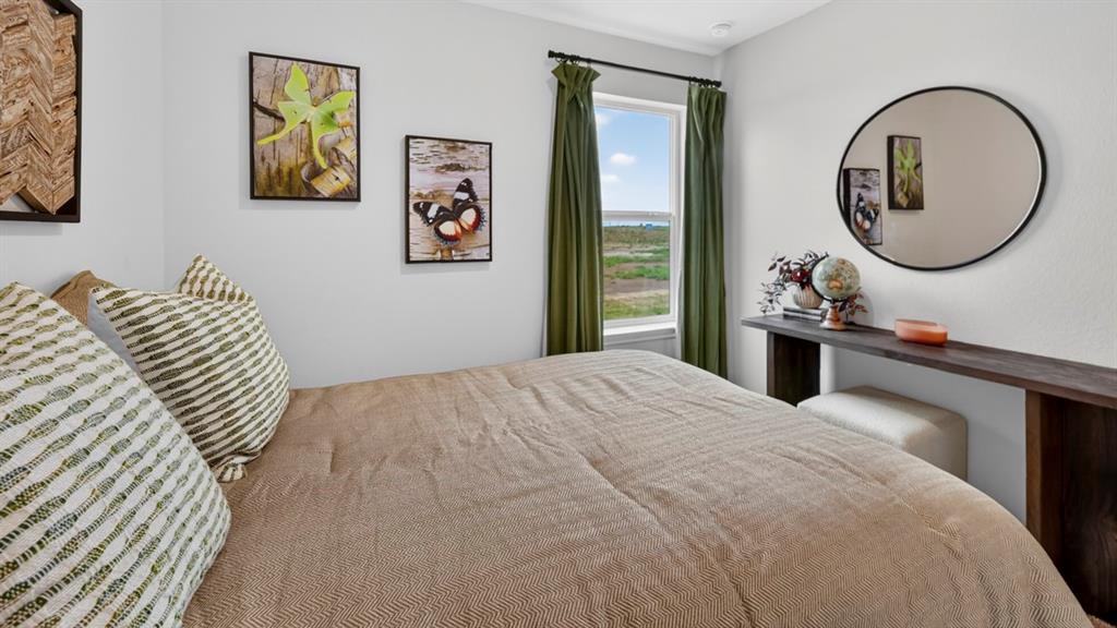 3514 Spring Time Street Terrell, TX 75126 - Photo 25 of 26 Neutral wall paint with window featuring green drapes