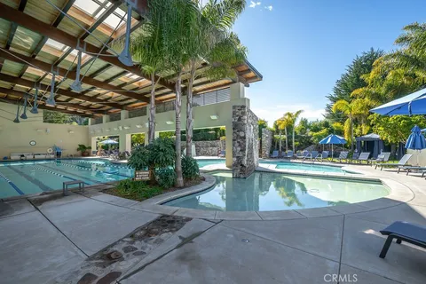 a view of a backyard with sitting area