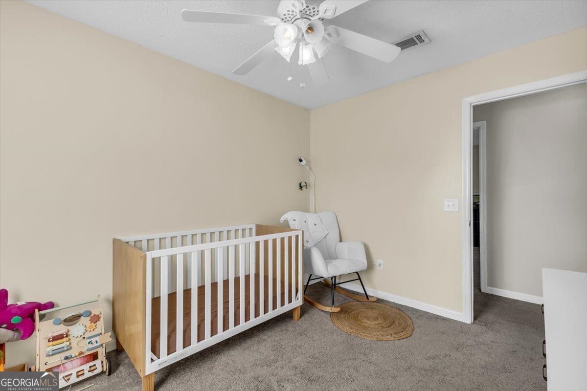 1244 Chinook Way Hinesville, GA 31313 - Photo 19 of 27 a view of a room with toys and white walls
