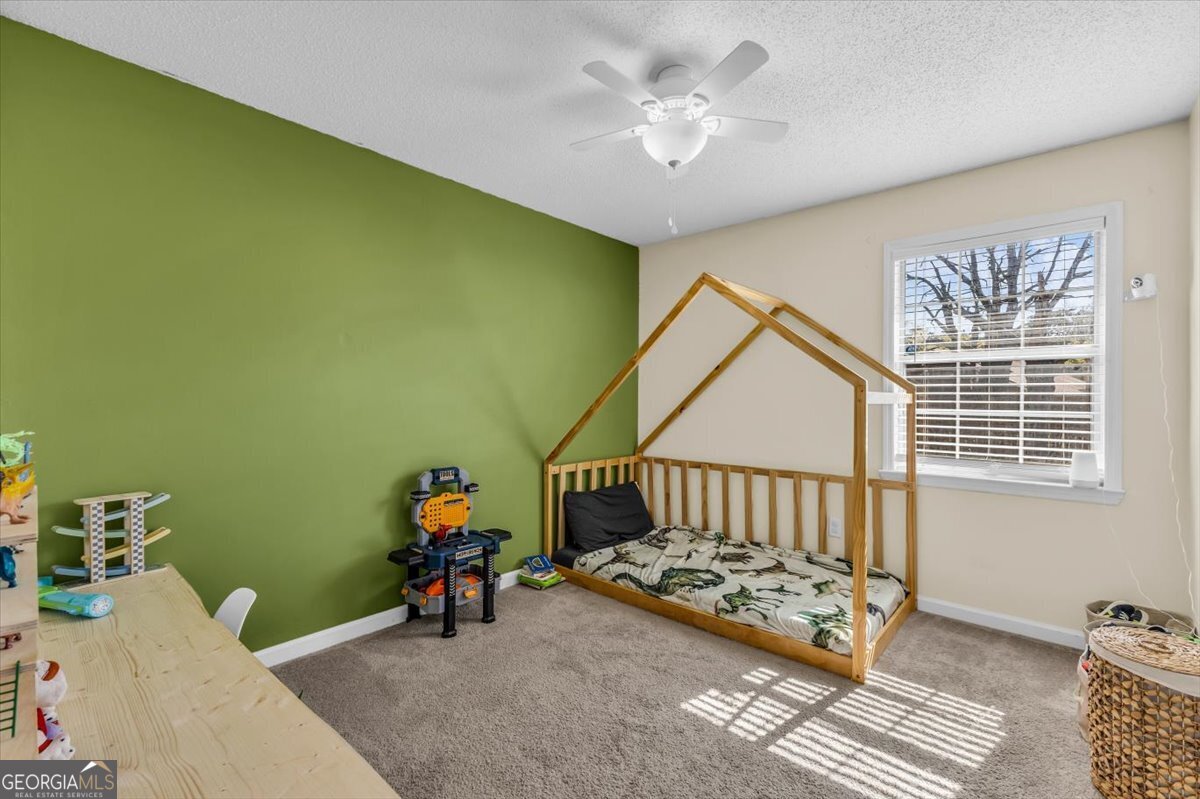 1244 Chinook Way Hinesville, GA 31313 - Photo 20 of 27 a bedroom with furniture and a window