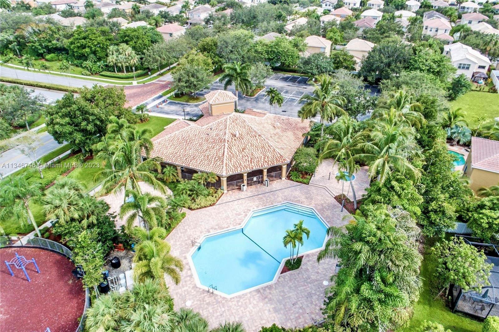 16392 Southwest 29th Street Miramar, FL 33027 - Photo 28 of 30 an aerial view of a house with yard swimming pool and outdoor seating