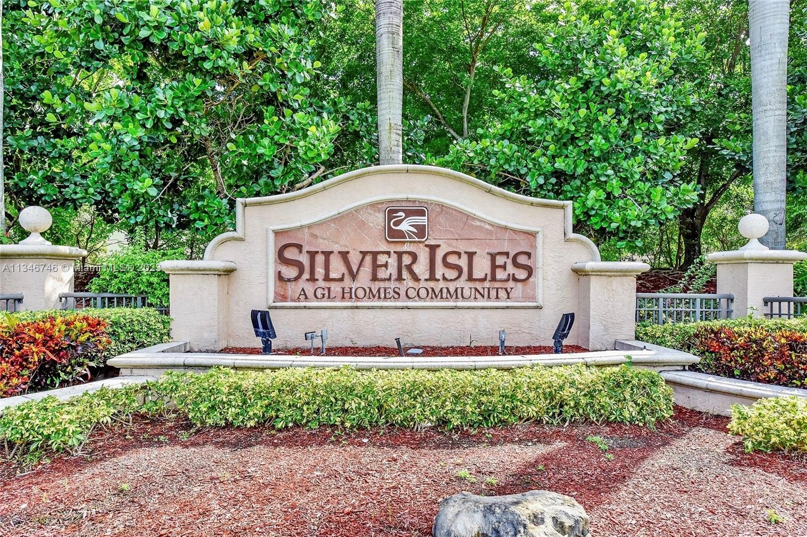 16392 Southwest 29th Street Miramar, FL 33027 - Photo 29 of 30 a sign on the side of the road