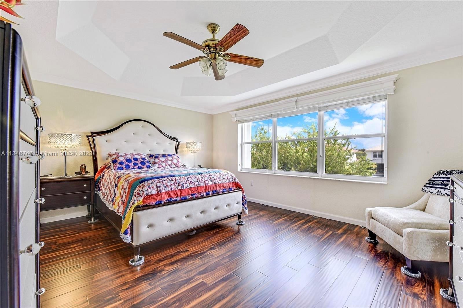 16392 Southwest 29th Street Miramar, FL 33027 - Photo 9 of 30 a bedroom with a bed and window