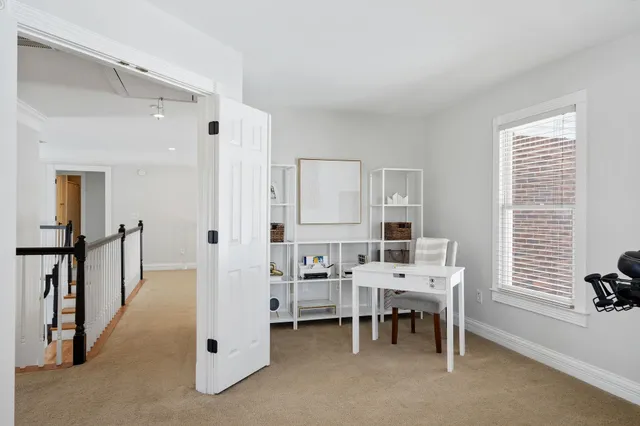 a room with furniture and window