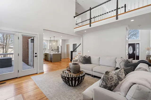 a living room with furniture or view of bedroom and a couch