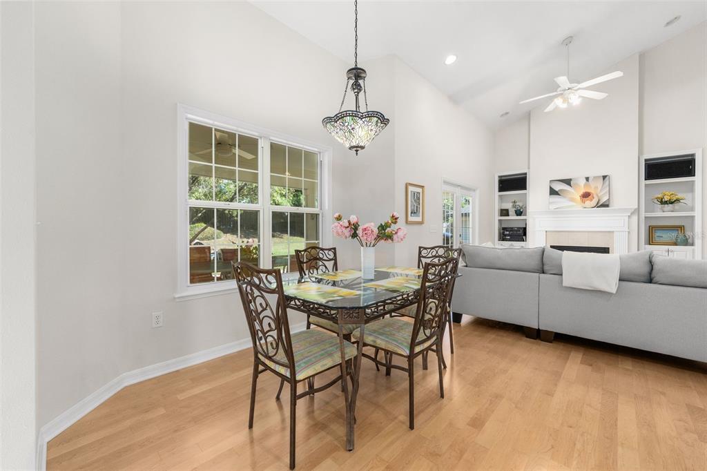 7418 White Oaks Road Alachua, FL 32615 - Photo 13 of 46 a view of a dining room with furniture window and outside view