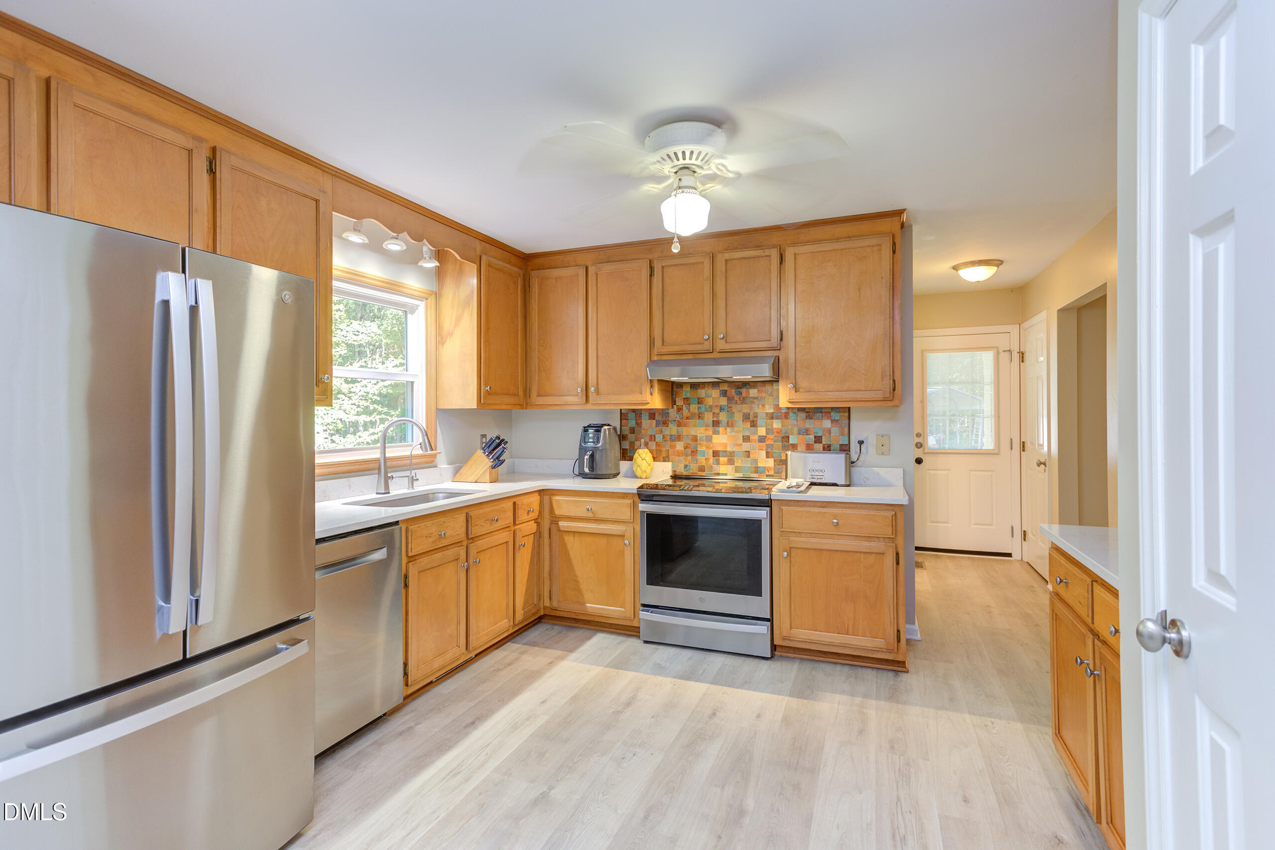 2120 New Sharon Church Road Hillsborough, NC 27278 - Photo 14 of 51 a kitchen with granite countertop white cabinets and white appliances