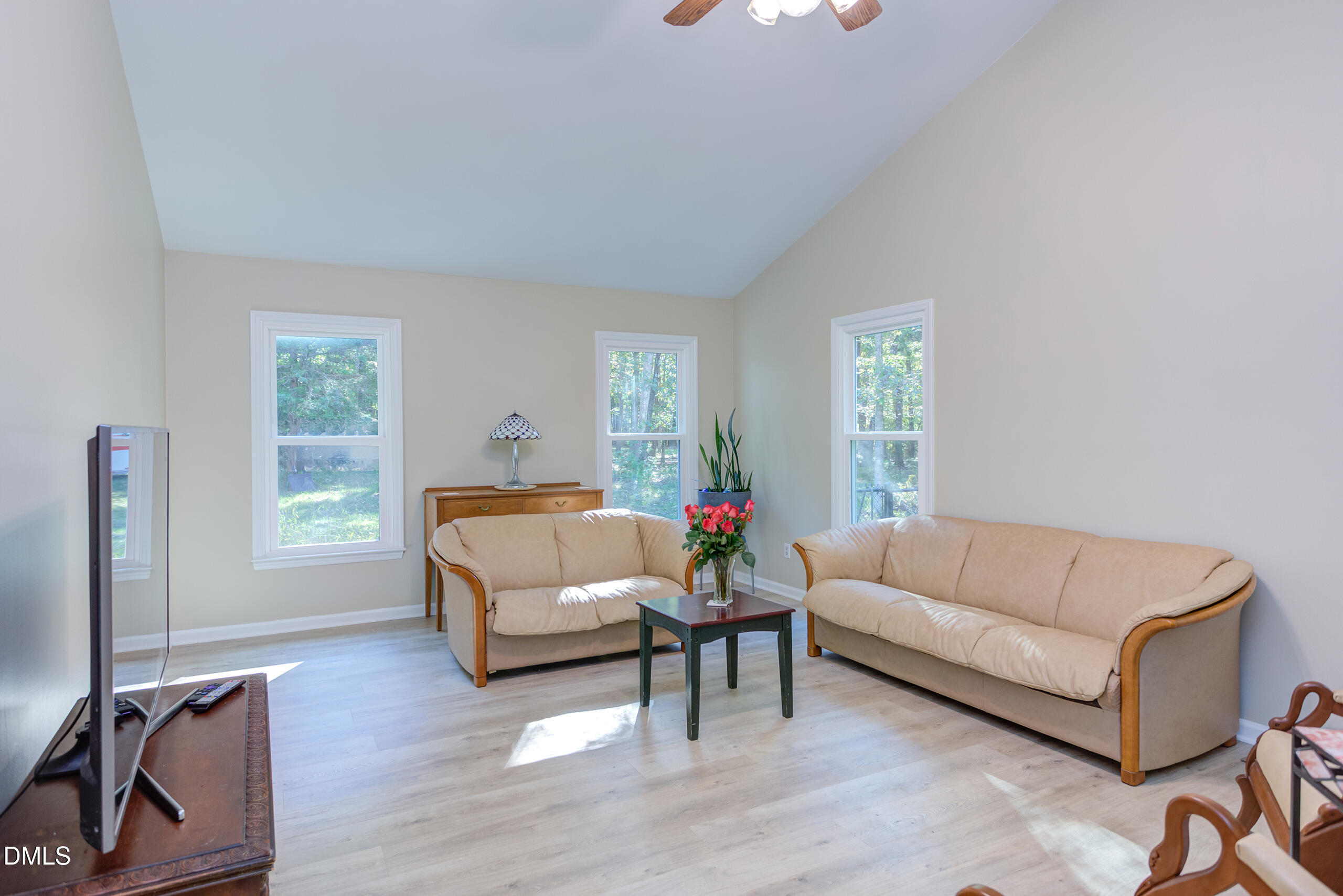2120 New Sharon Church Road Hillsborough, NC 27278 - Photo 19 of 51 a living room with furniture and a flat screen tv