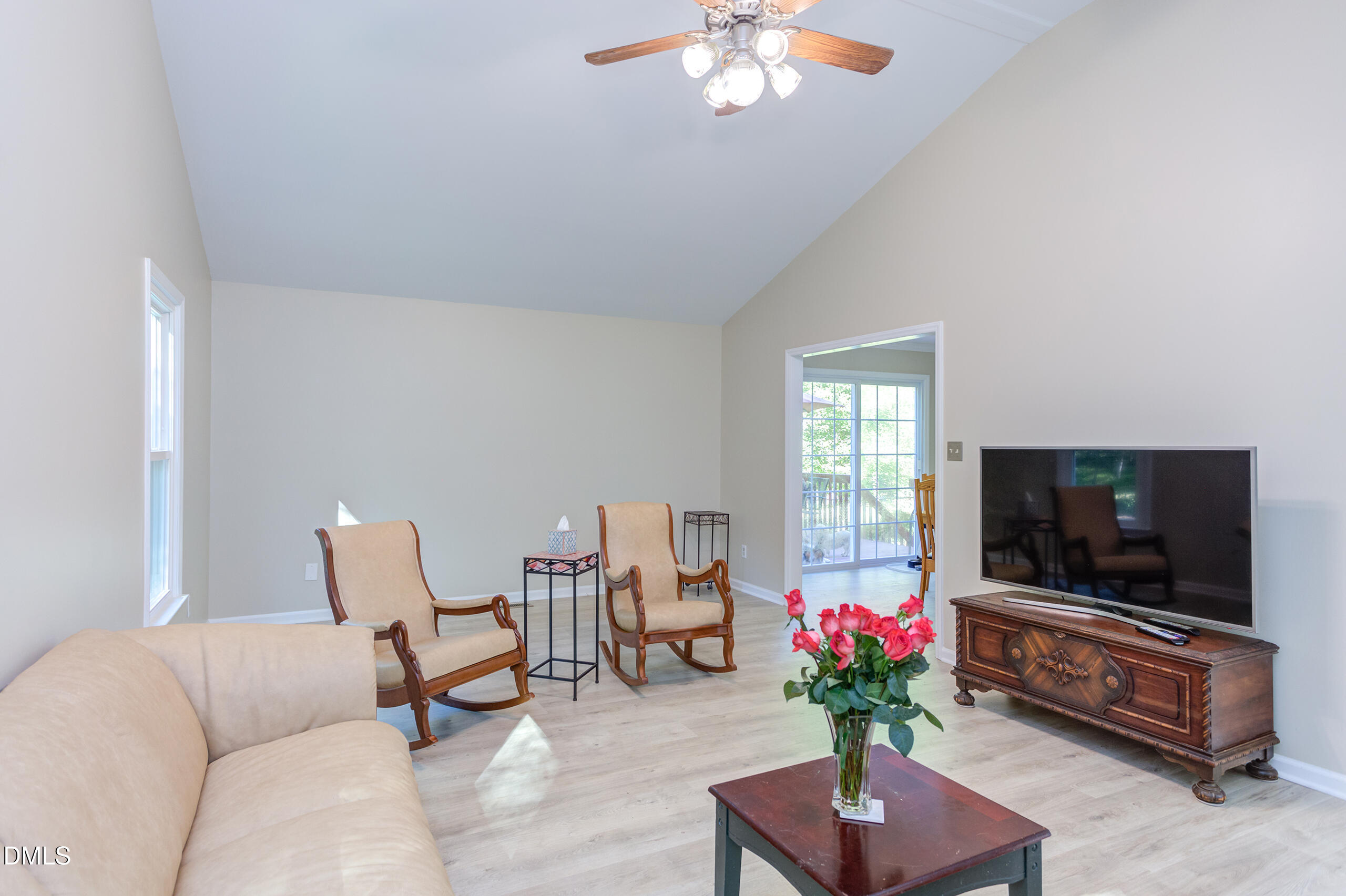 2120 New Sharon Church Road Hillsborough, NC 27278 - Photo 21 of 51 a living room with furniture and a flat screen tv