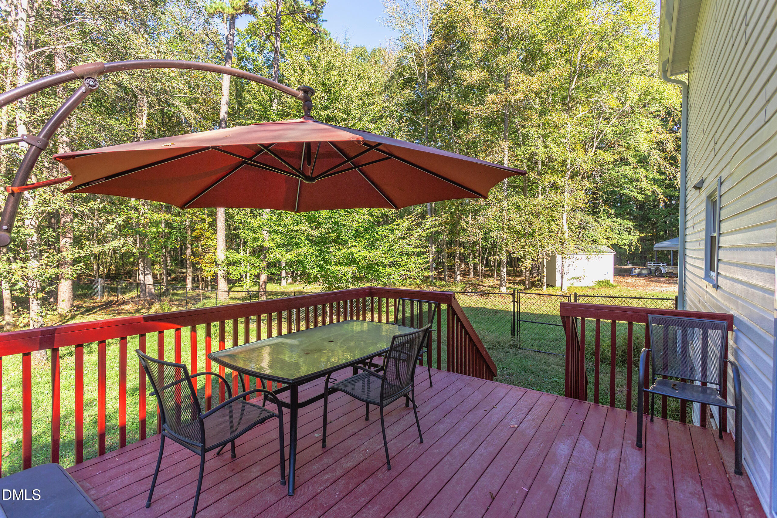 2120 New Sharon Church Road Hillsborough, NC 27278 - Photo 35 of 51 a view of balcony with outdoor seating and wooden floor