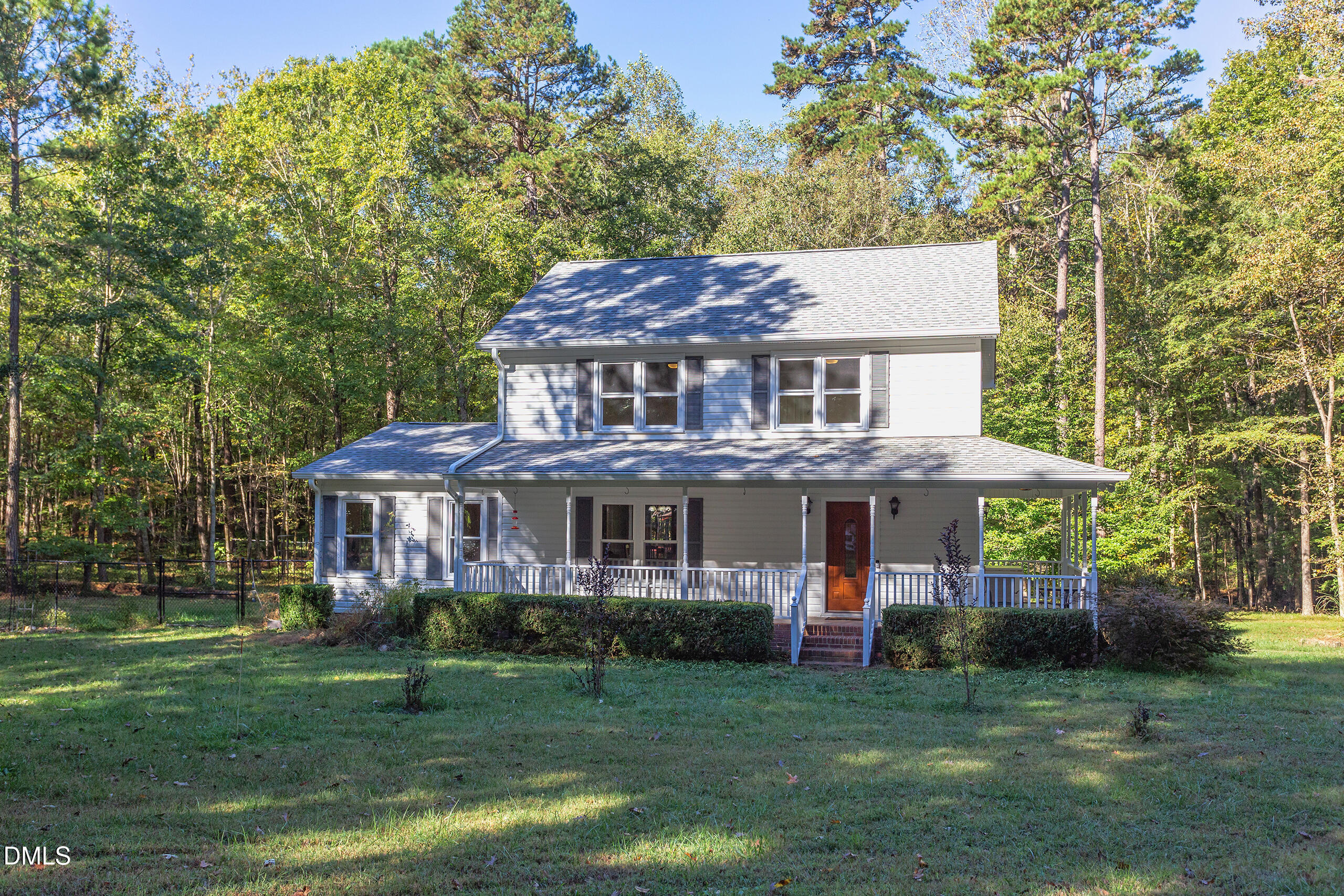 2120 New Sharon Church Road Hillsborough, NC 27278 - Photo 4 of 51 a front view of a house with a garden