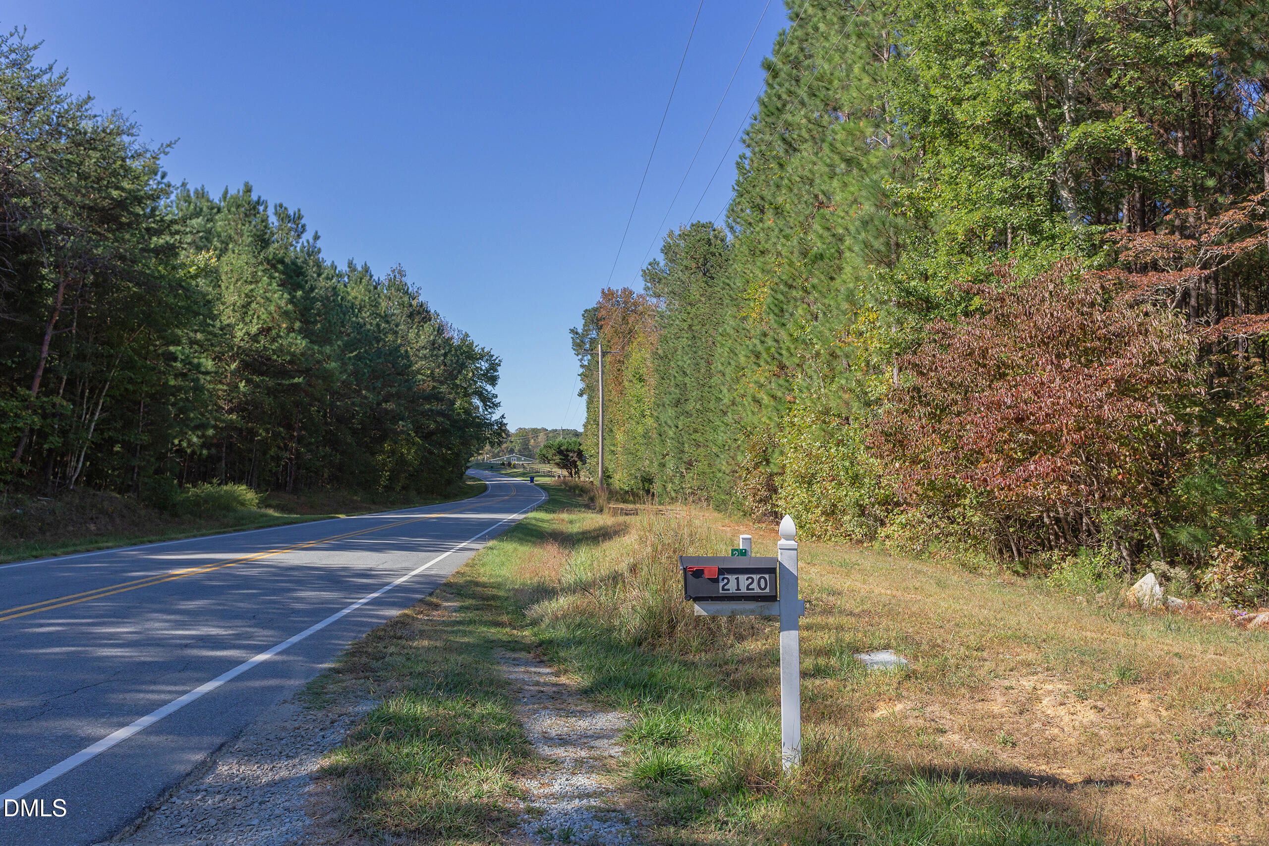 2120 New Sharon Church Road Hillsborough, NC 27278 - Photo 49 of 51 a backyard of a house with table and chairs