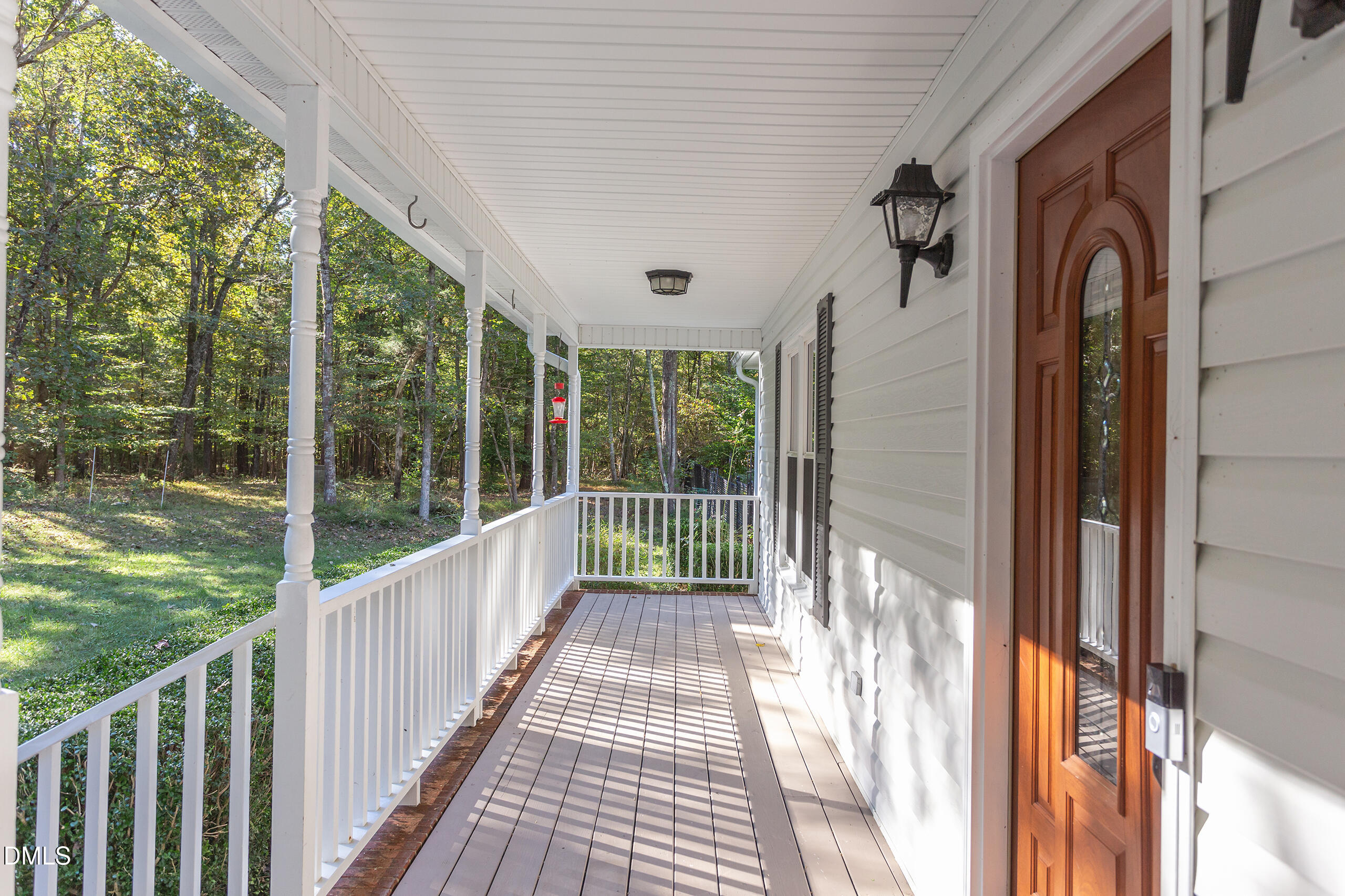2120 New Sharon Church Road Hillsborough, NC 27278 - Photo 8 of 51 a view of a porch with wooden floor and outdoor space