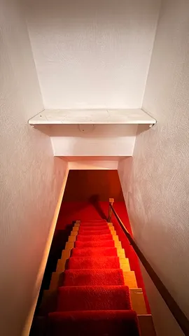 a kitchen with stainless steel appliances granite countertop a refrigerator and a stove