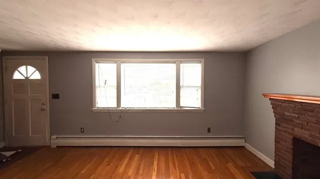 a bathroom with a toilet a bath tub and a shower