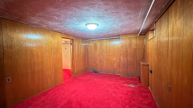 a kitchen with stainless steel appliances a refrigerator sink and cabinets