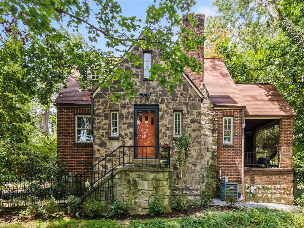 front view of a house with a small yard
