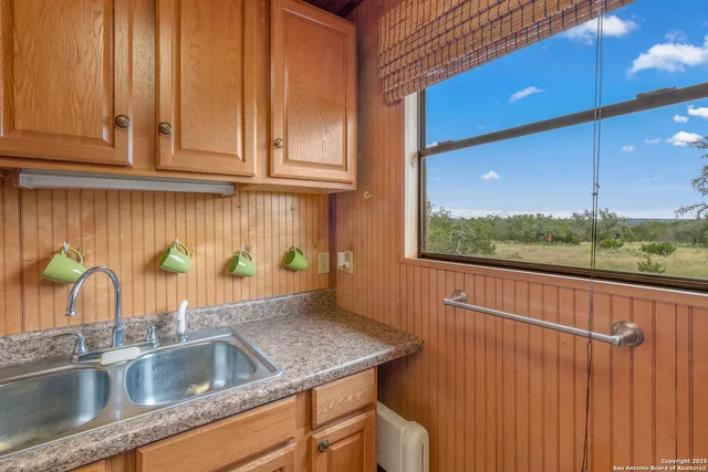 a view closed with a sink and dishwasher