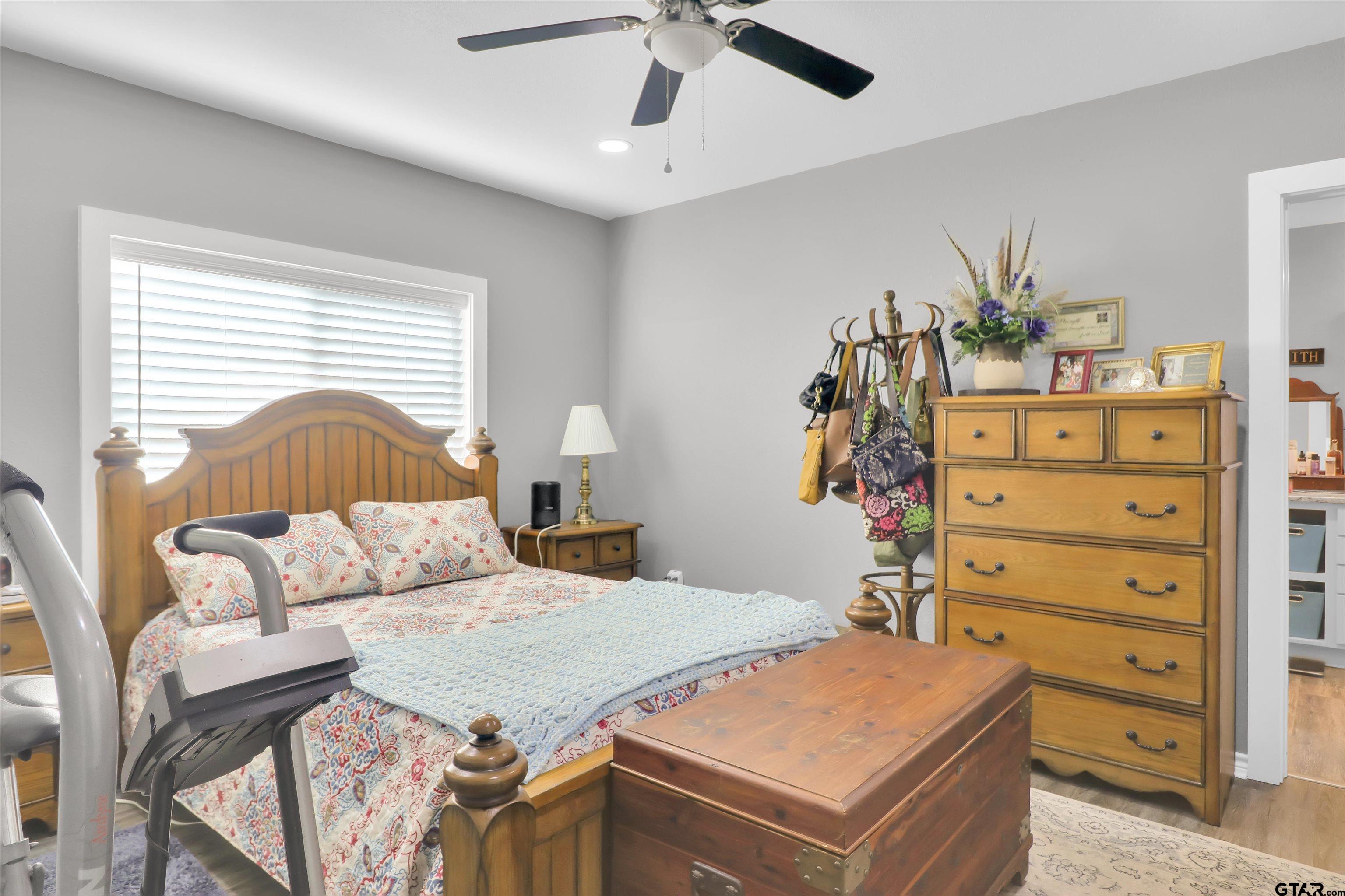 554 East San Antonio Street Alto, TX 75925 - Photo 19 of 28 a bedroom with a bed and dresser