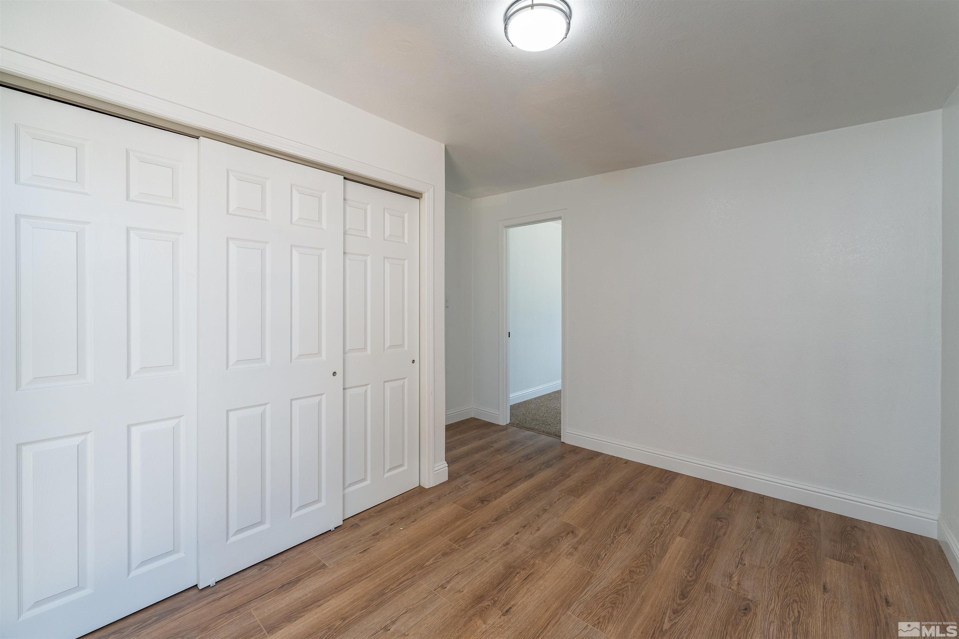 1815 Radcliffe Drive Reno, NV 89502 - Photo 17 of 22 a view of a room with wooden floor