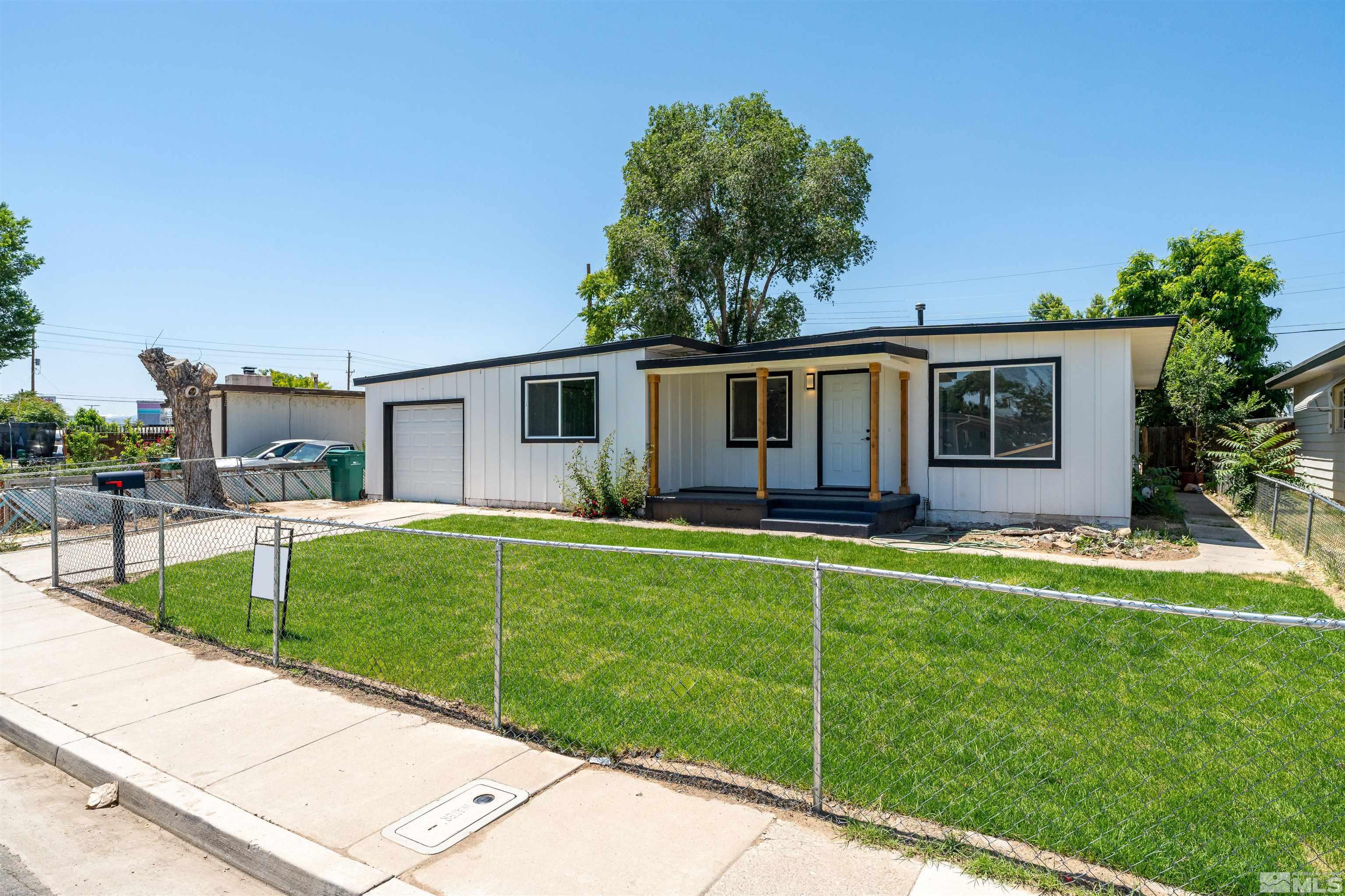 1815 Radcliffe Drive Reno, NV 89502 - Photo 2 of 22 a house view with a garden space