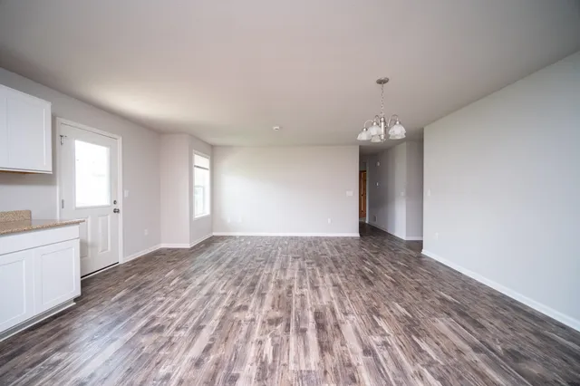 a view of an empty room and window
