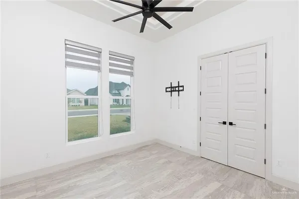 an empty room with windows