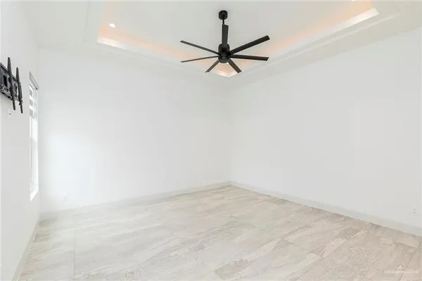 a view of a room with a fan