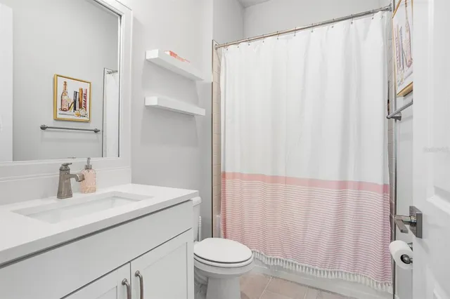 a bedroom with a bed and a cabinets