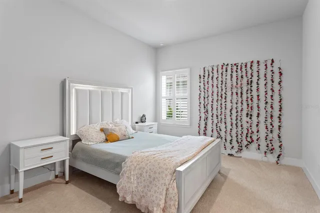 a workspace with lounge chair and a window