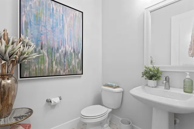 a living room with furniture and a garden