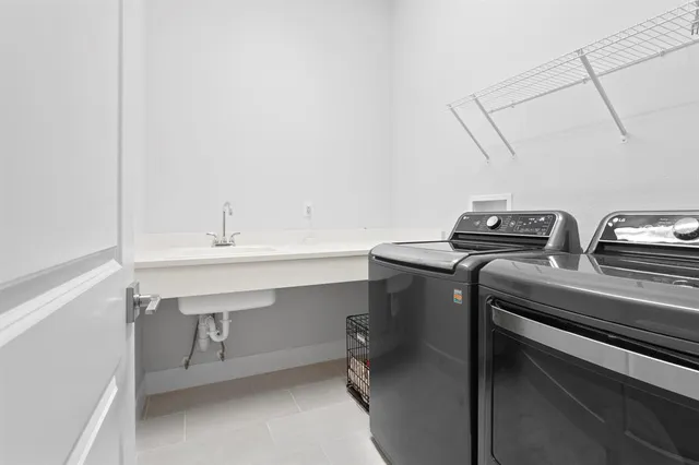 a view of a lake with houses in the background