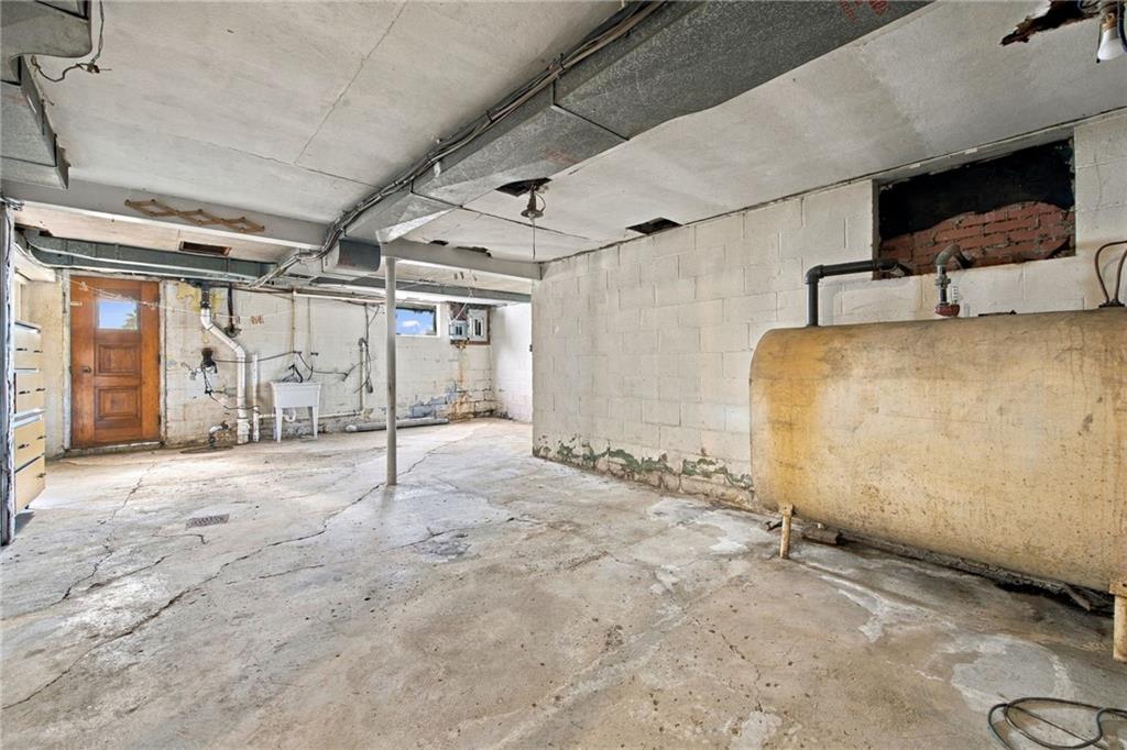 322 Mark Road Herminie, PA 15637 - Photo 46 of 50 FULL unfinished Large Basement Walk-out Door to Yard