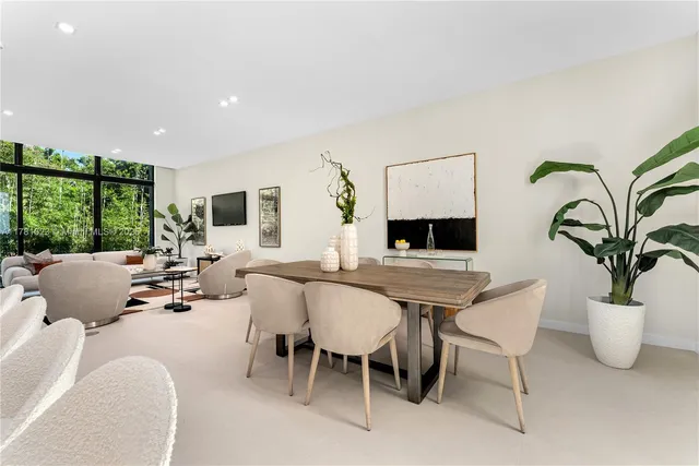 a view of living room with furniture and flat screen tv