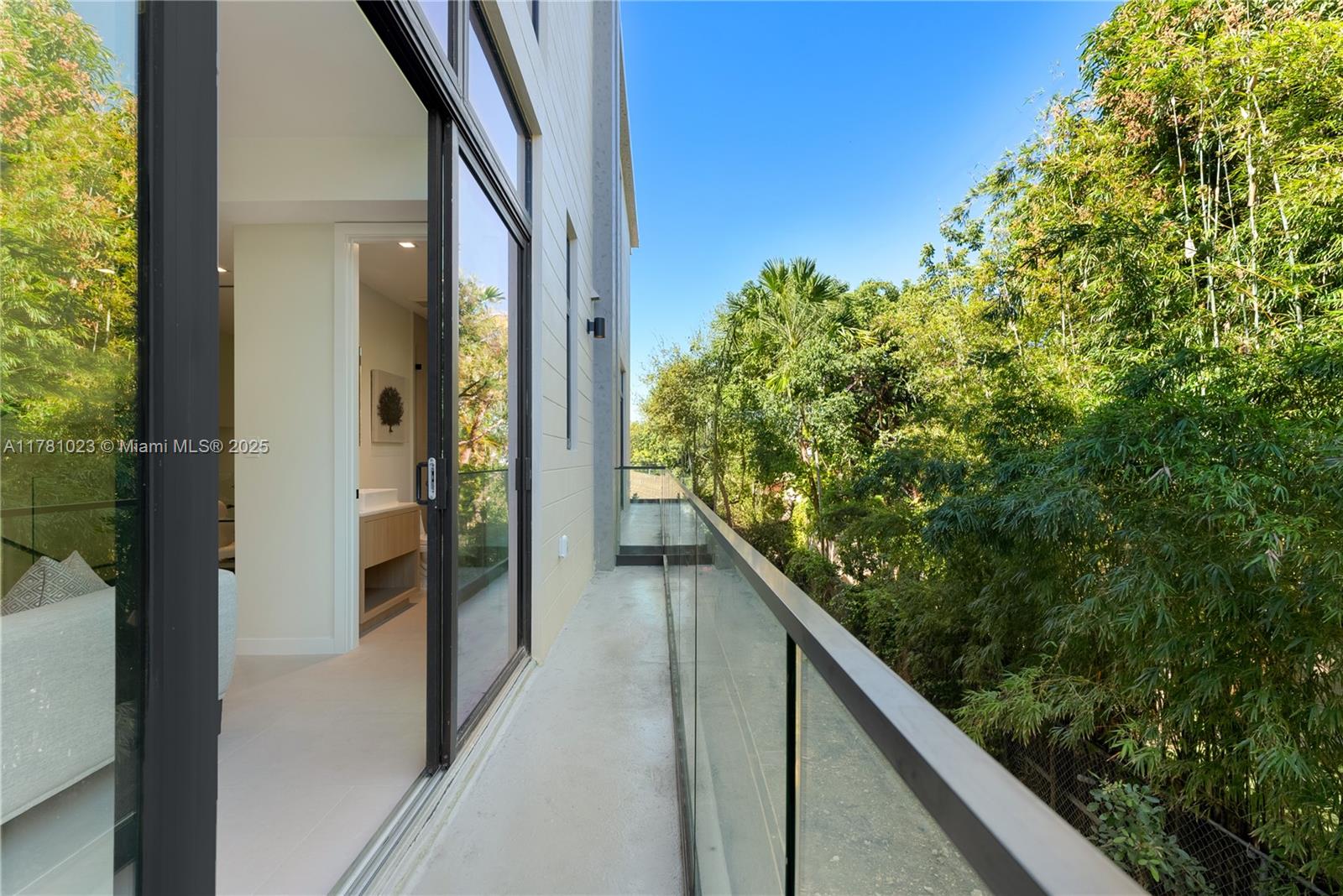 2501 Southwest 27th Street, Unit 2 Miami, FL 33133 - Photo 21 of 41 a balcony with a plant in front of it