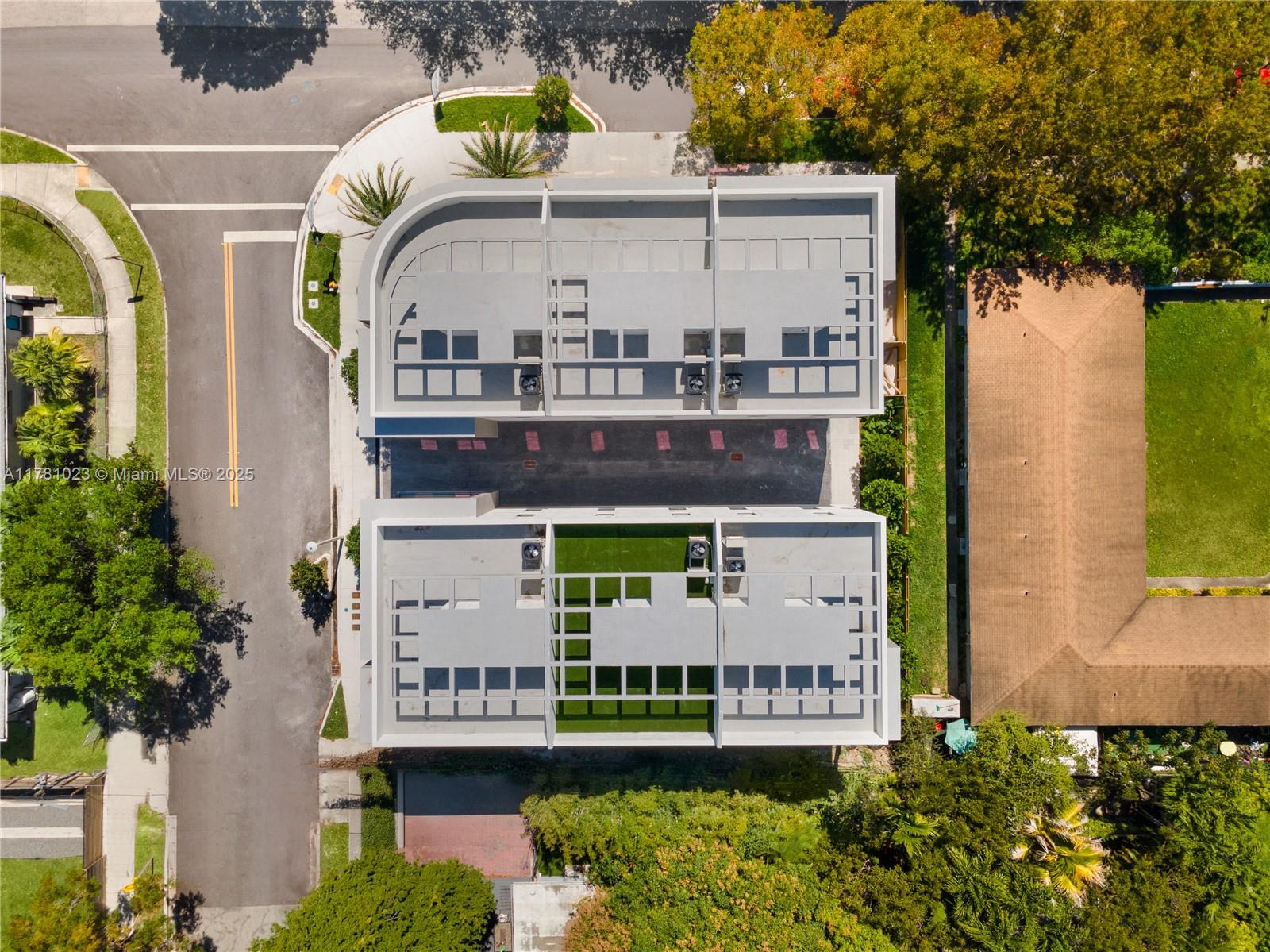 2501 Southwest 27th Street, Unit 2 Miami, FL 33133 - Photo 3 of 41 an aerial view of a house with a ocean view