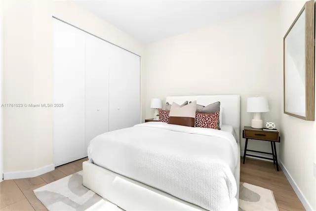 an empty room with wooden floor