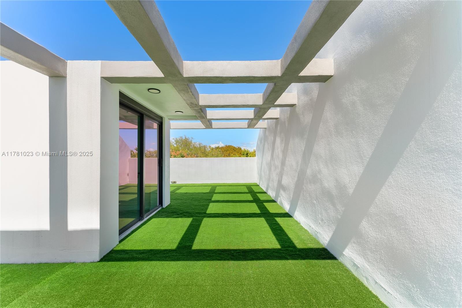 2501 Southwest 27th Street, Unit 2 Miami, FL 33133 - Photo 39 of 41 a view of outdoor space and deck