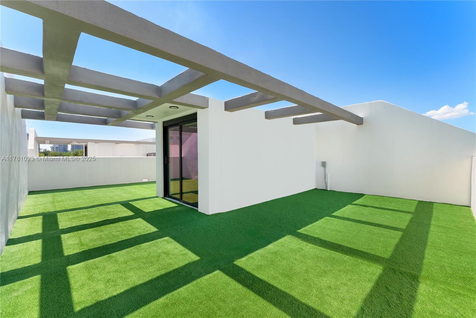 2501 Southwest 27th Street, Unit 2 Miami, FL 33133 - Photo 40 of 41 a view of a backyard of the house