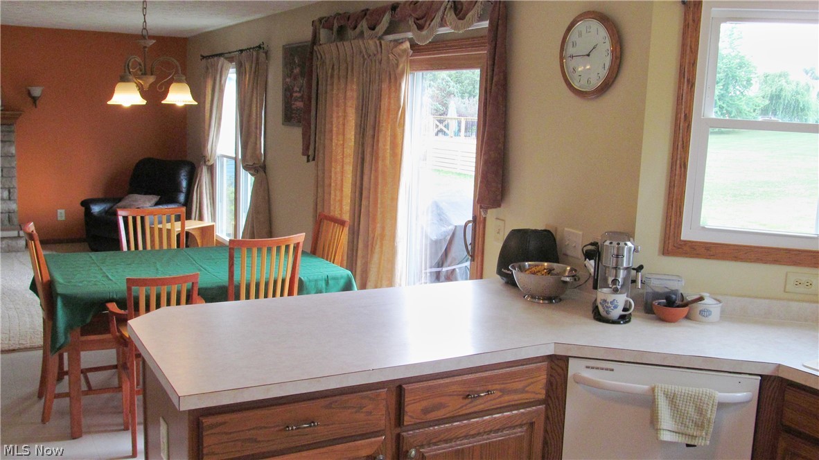 121 Joshua Drive Rittman, OH 44270 - Photo 6 of 32 Open Flow from Kitchen-Dining Area-Family Room