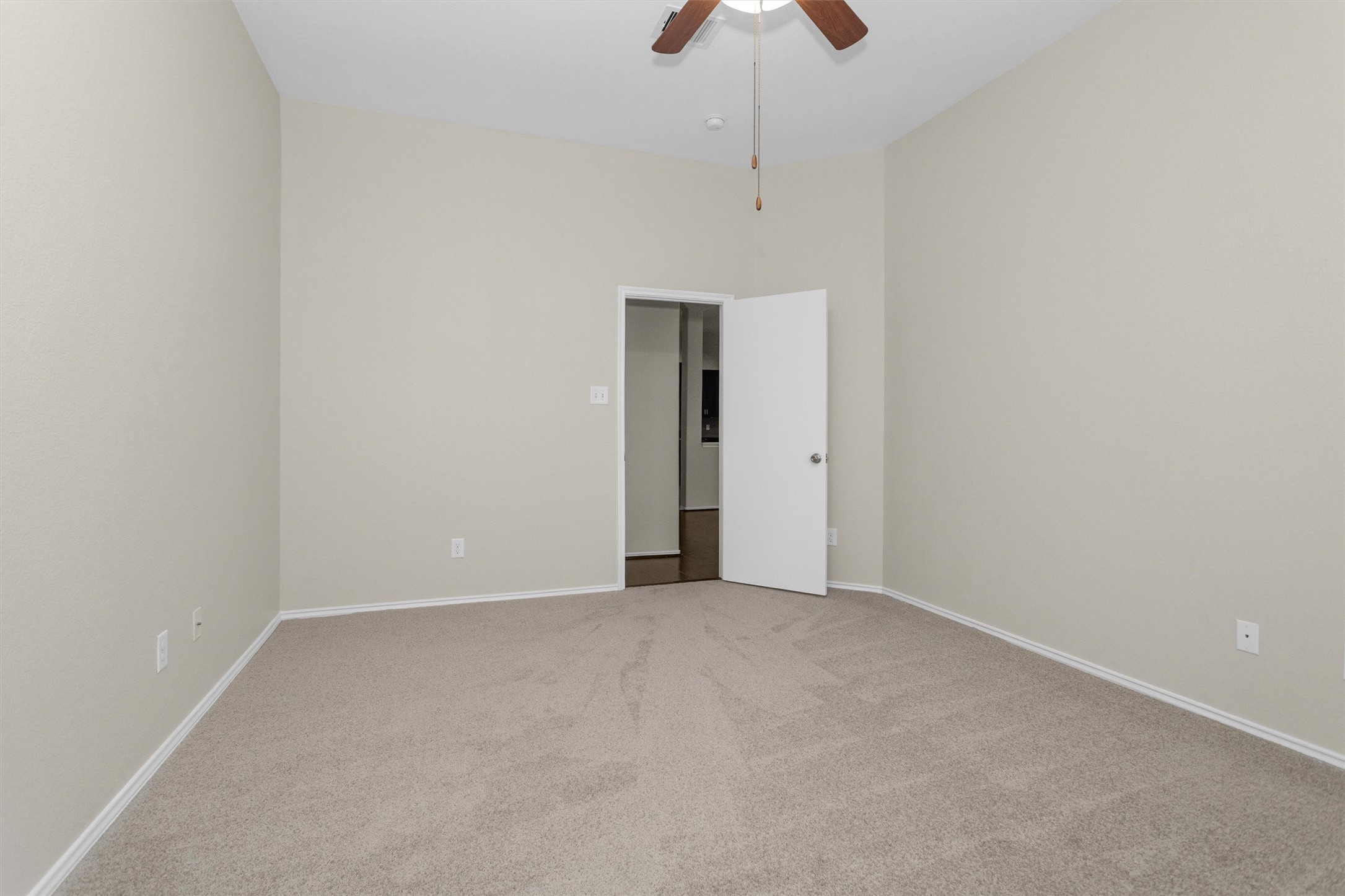 21419 Fossil Trails Drive Spring, TX 77388 - Photo 21 of 42 an empty room with chandelier fan