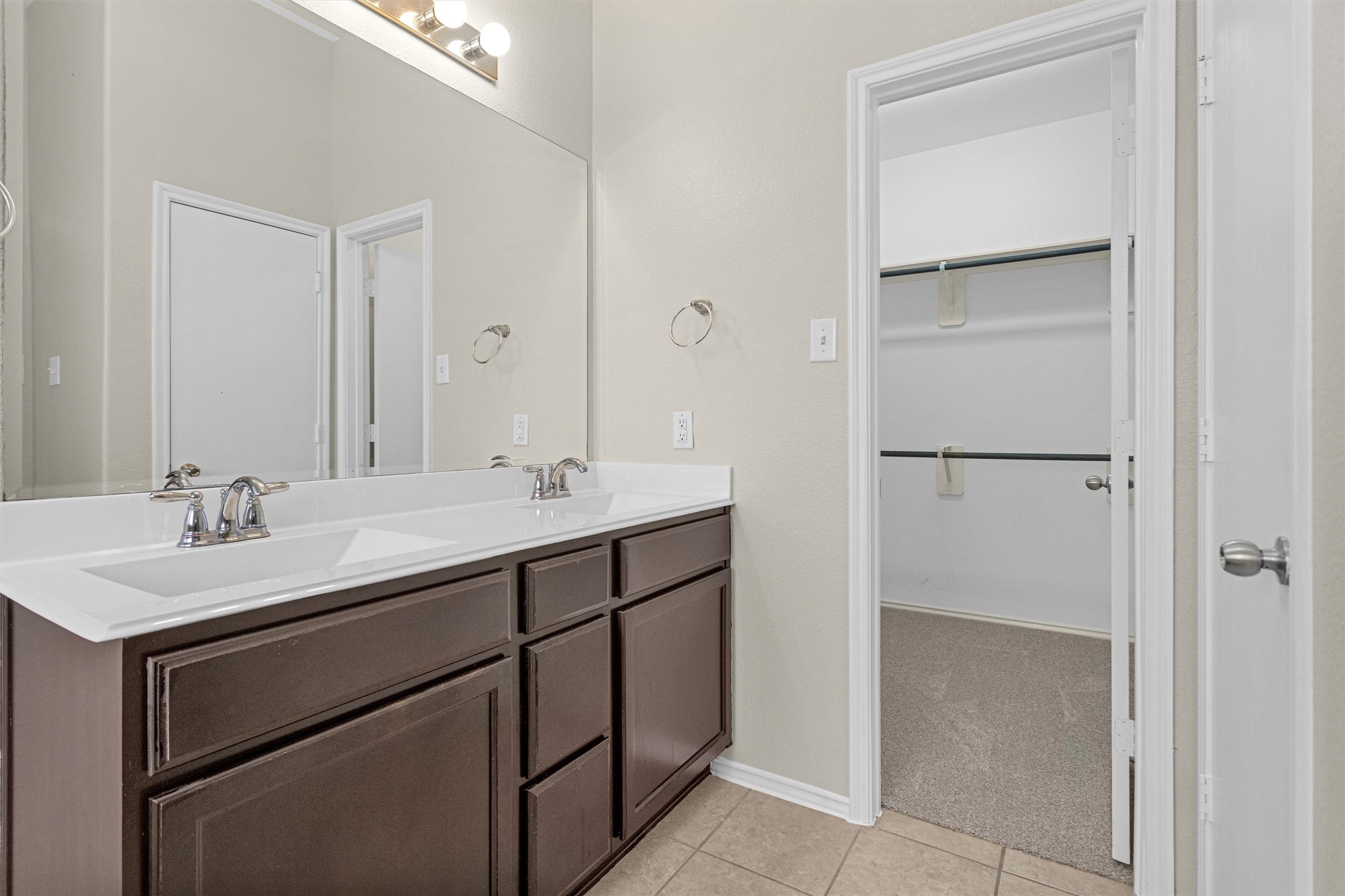 21419 Fossil Trails Drive Spring, TX 77388 - Photo 22 of 42 a bathroom with a sink and a mirror
