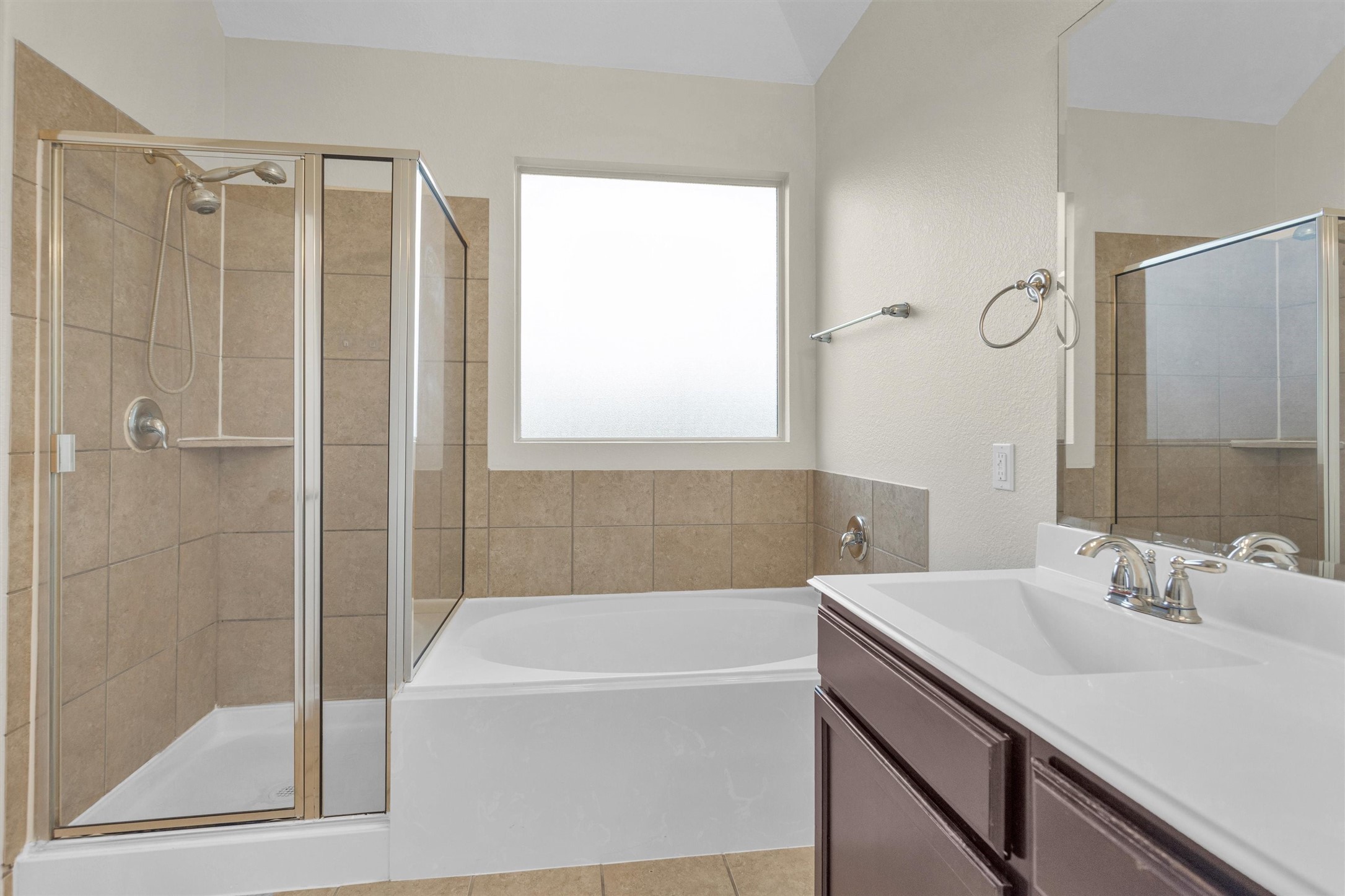 21419 Fossil Trails Drive Spring, TX 77388 - Photo 23 of 42 a bathroom with a bathtub shower sink and mirror