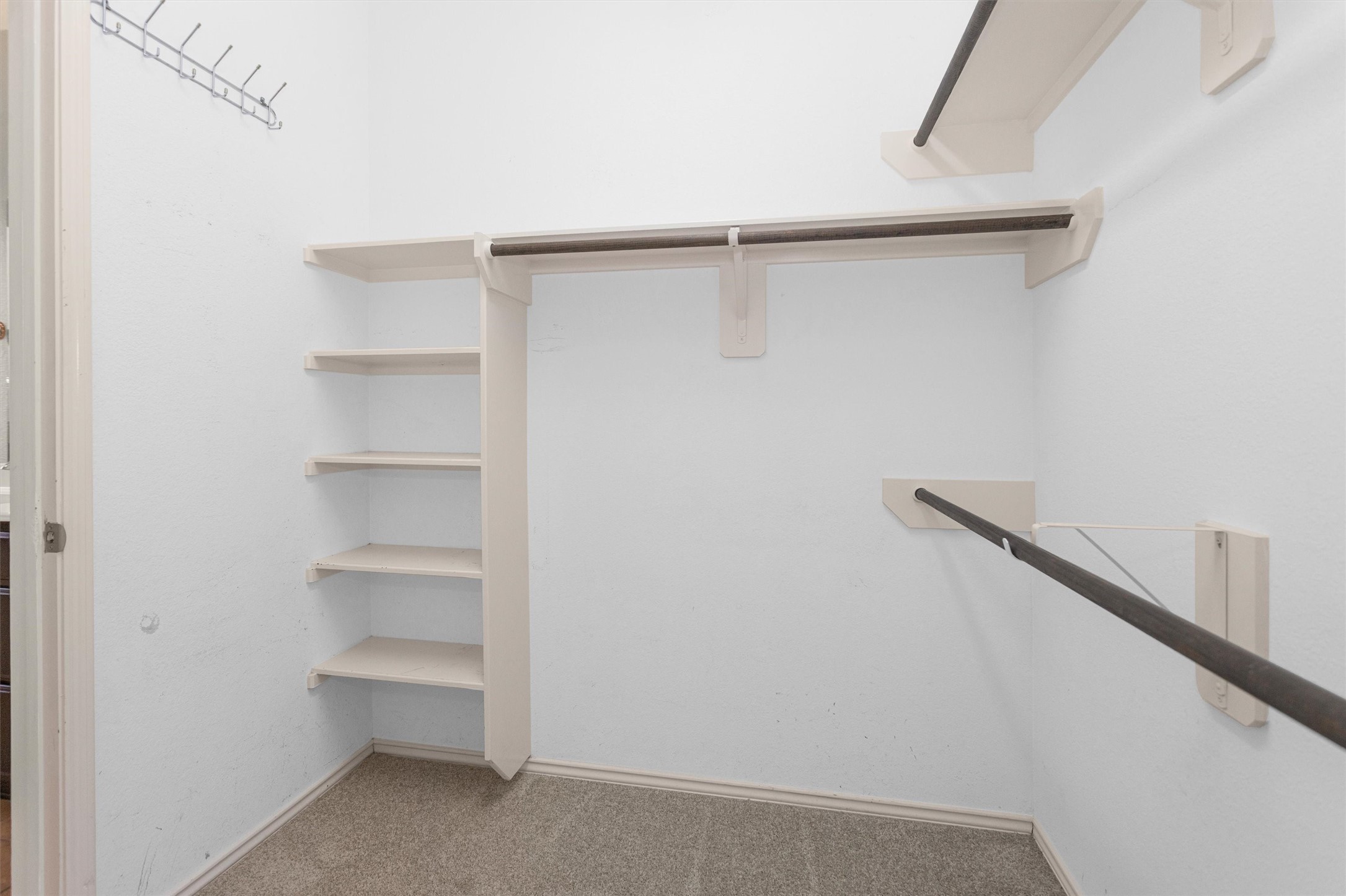 21419 Fossil Trails Drive Spring, TX 77388 - Photo 25 of 42 a view of an empty walk in closet