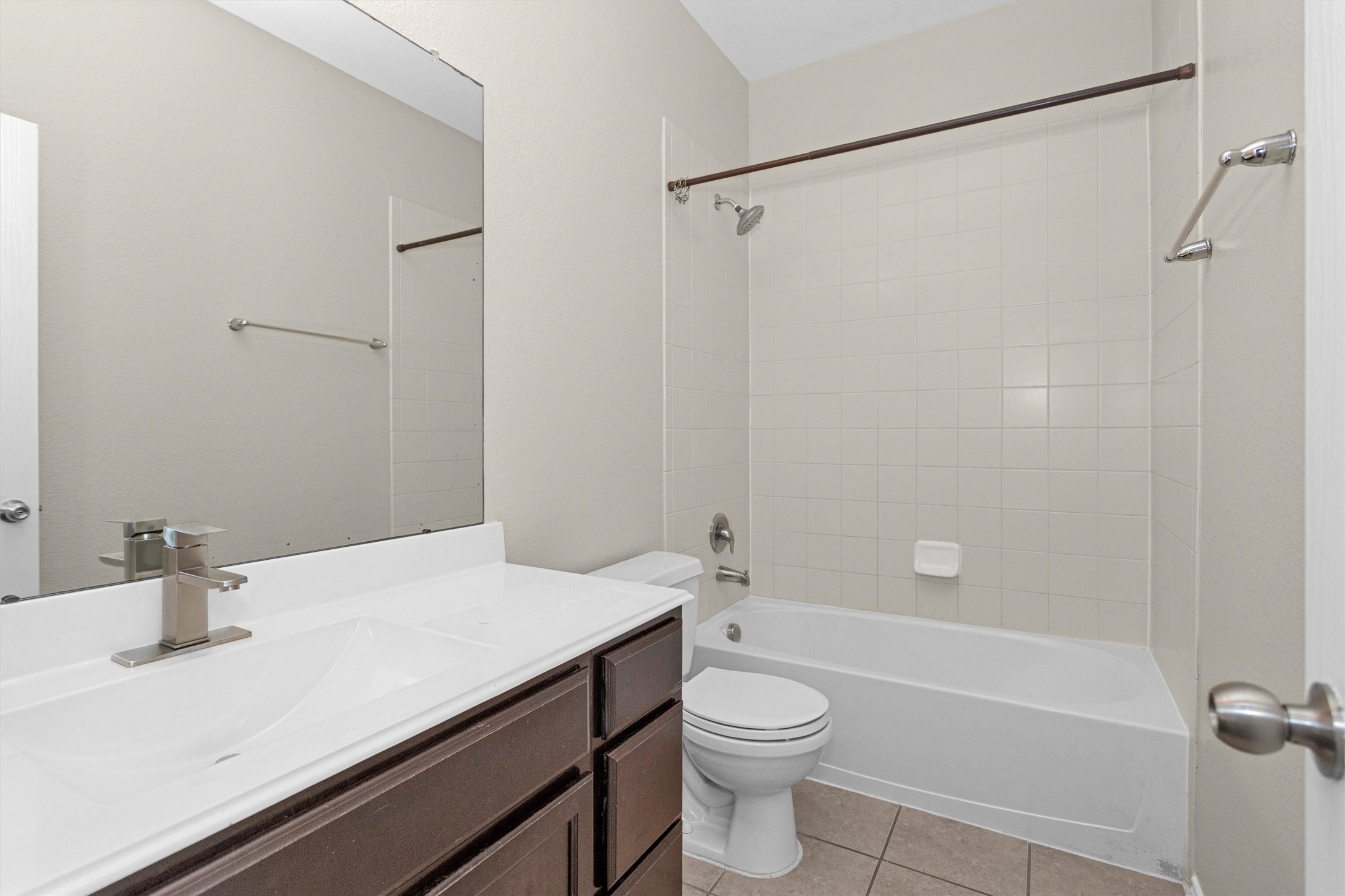 21419 Fossil Trails Drive Spring, TX 77388 - Photo 28 of 42 a bathroom with a sink a toilet and shower