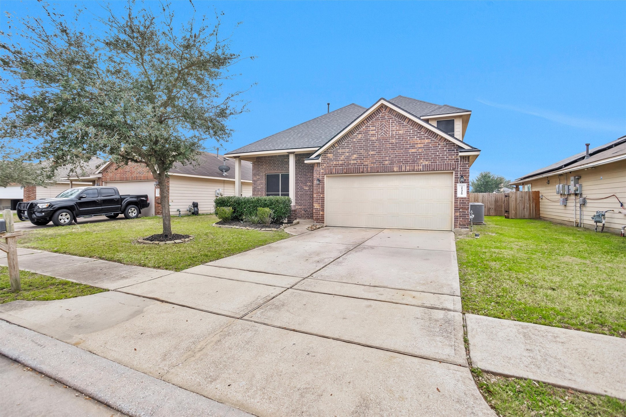 21419 Fossil Trails Drive Spring, TX 77388 - Photo 3 of 42 a front view of house with yard